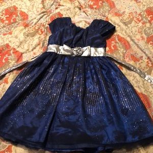 Girls navy sparkled dress.